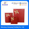 Customized !China Factory 250gsm Coated Paper Bowknot Color Print Paper Gift Bag